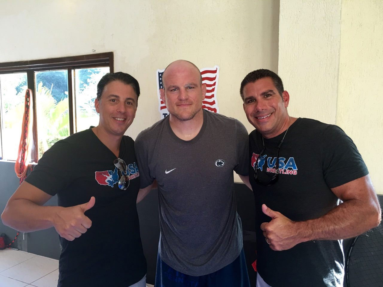 Dr. Mike, US Coach Cael Sanderson, and Dr. Carl Conforti